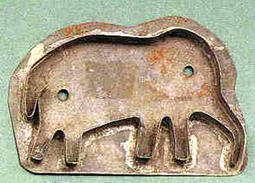 19th century Pennsylvania tin cookie cutter in the form of a standing elephant