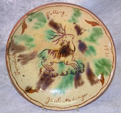 Jacob Medinger Pennsylvania Sgraffito decorated redware plate with deer decoration
