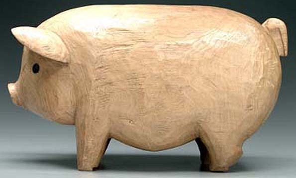 Folk art carved wood pig