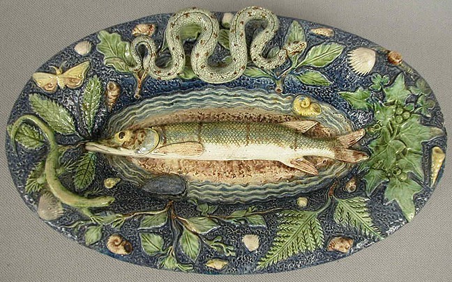 French Palissy Ware small oval plaque with fish on sand bar in center, snake, lizard, butterfly, shells and plant life