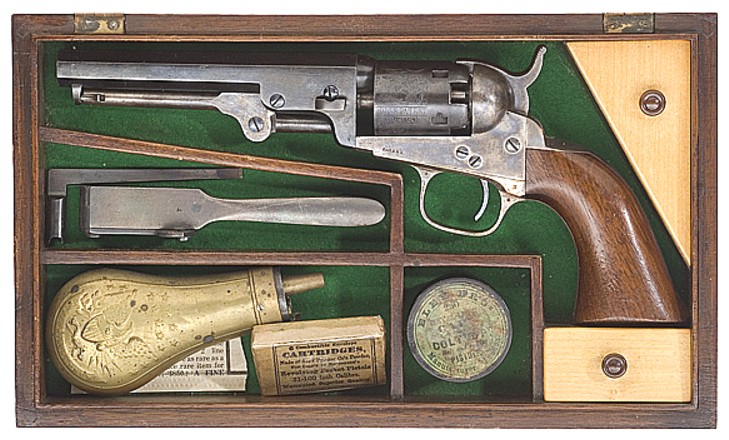 A cased Colt Model 1849 Pocket Revolver with accessories