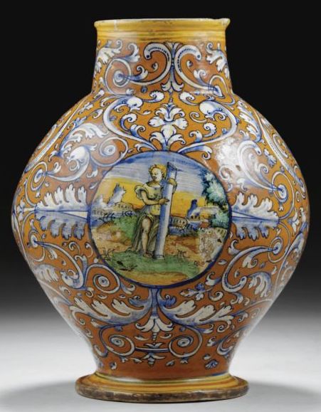 Italian Majolica bulbous vase, circa 1530, Faenza painted with an arrangement of scrolling acanthus on an orange ground