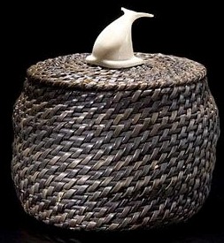 Eskimo baleen basket with diving whale finial of walrus ivory