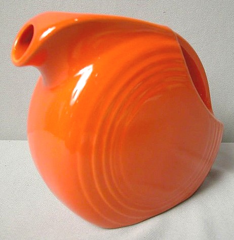 Fiesta disc juice pitcher in red glaze