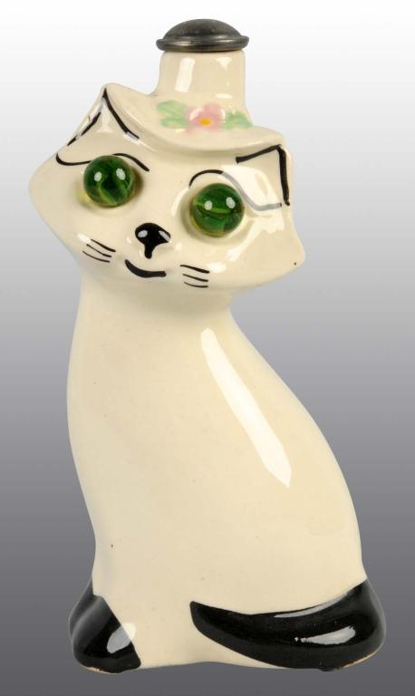 Porcelain ironing sprinkler bottle, black and white cat with green marble eyes