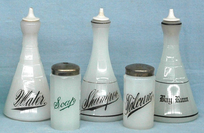 Opaline bottles, marked "MACO", three barber bottles, soap and talcum containers 