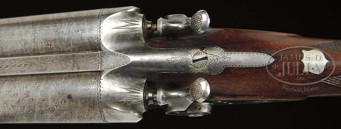 An early Parker Brothers No. 2 lifter hammer shotgun with original case and accessories. 