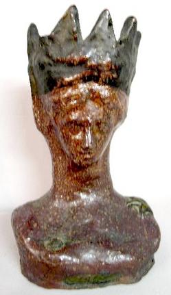 An early 20th century Ohio Statue of Liberty sewer tile bust. Dated 1918 with original black pigment on crown.