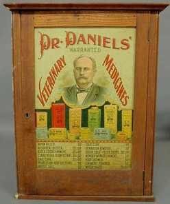 Dr. Daniels Veterinary Medicine oak display cabinet