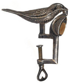 A circa 1860 cast iron finch sewing bird inscribed A. Jerould & Co. Patent